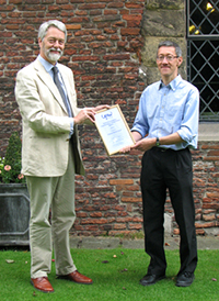 Professor Mike Mendl (right) receives the UFAW Medal from Dr Robert Hubrecht, UFAW Chief Executive, at the UFAW conference held at the York Merchant Adventurers&rsquo; Hall on 26th June